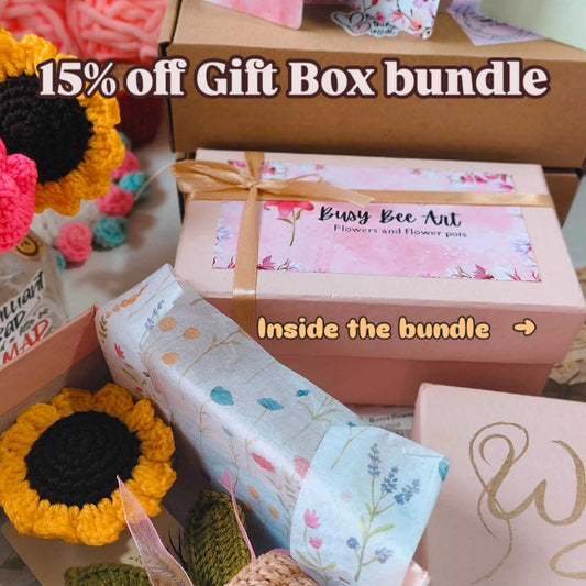 Gift box bundle with decorative items and a 15% off discount text.