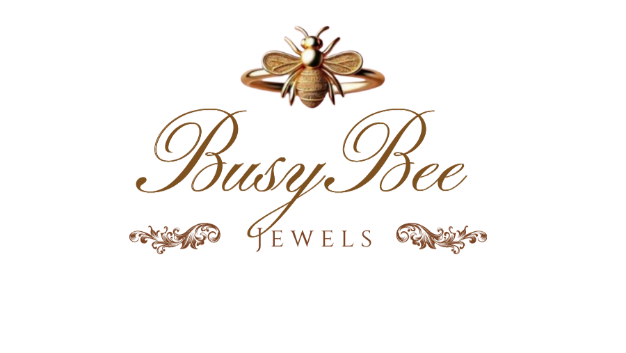 Logo of Busy Bee Jewels with a gold bee and elegant text on a white background