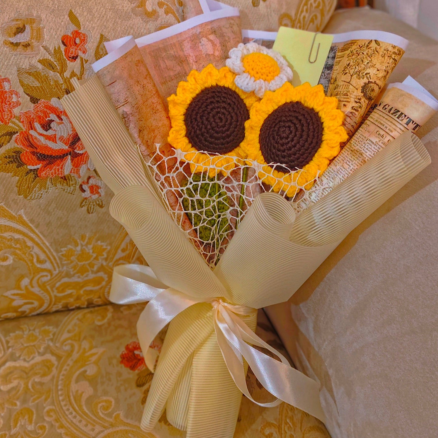 Bouquet of sunflower-shaped cookies on a floral-patterned surface