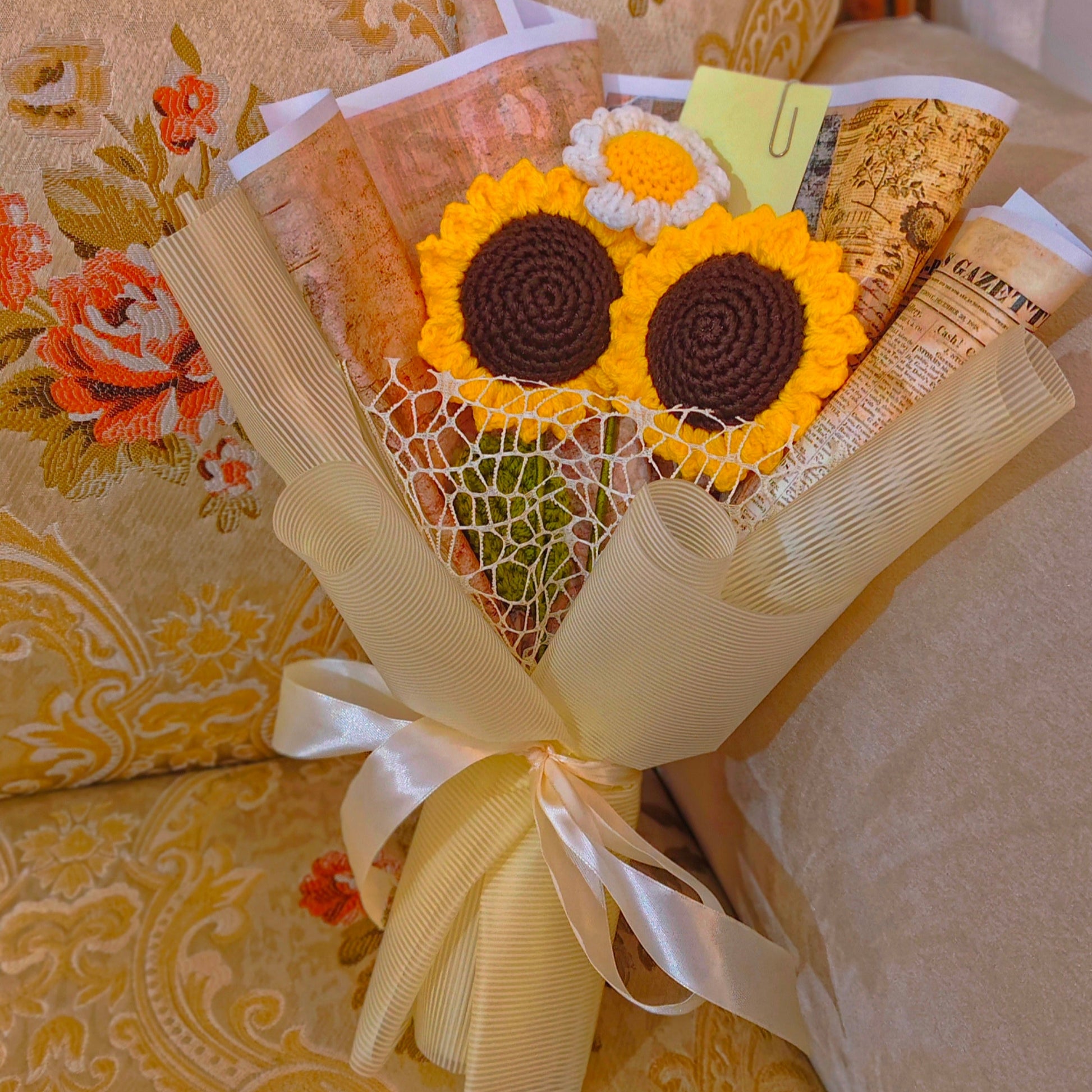 Bouquet of sunflower-shaped cookies on a floral-patterned surface